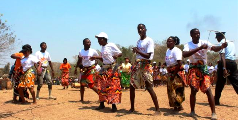 Mambwe dancers in traditional dress at a celebration